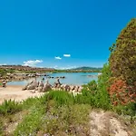 Апарт-отель Baia De Bahas - In Marinella Just 200 Mt From The Sea 3*